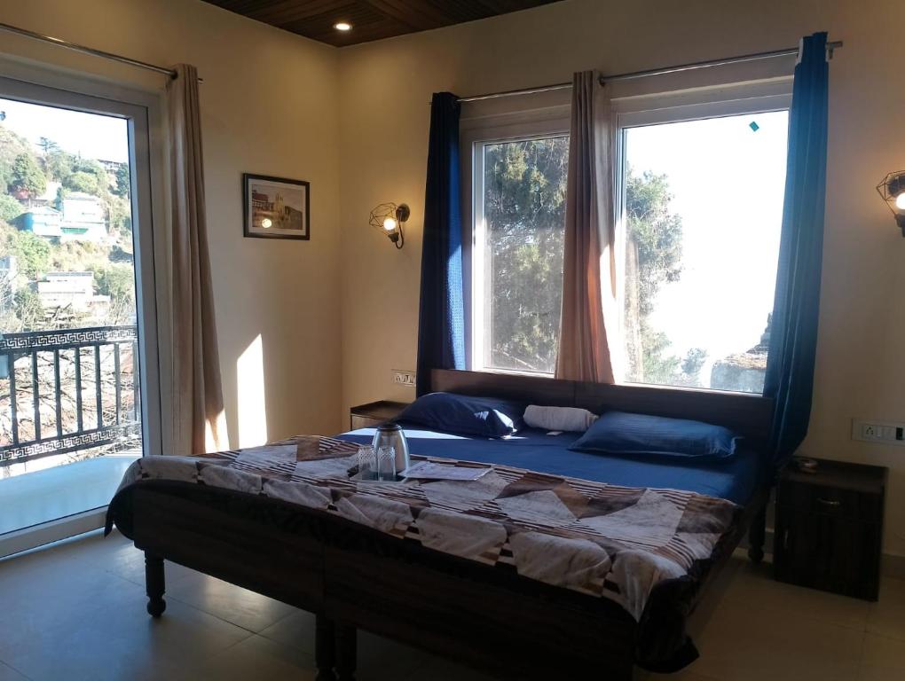 Postel nebo postele na pokoji v ubytování Himalayan view stay - Pahado wala ghar