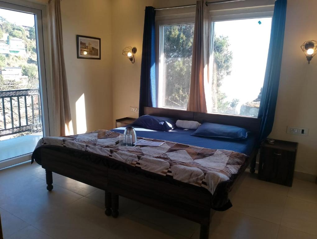 Postel nebo postele na pokoji v ubytování Himalayan view stay - Pahado wala ghar
