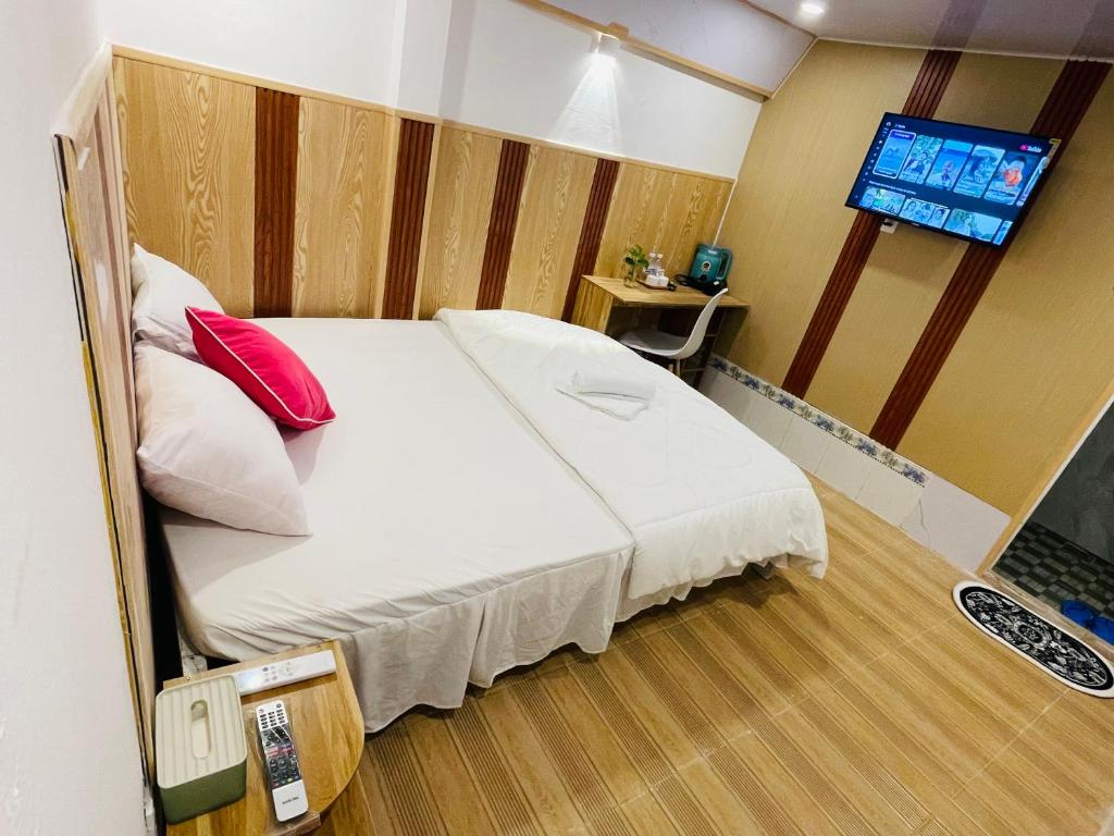 Postel nebo postele na pokoji v ubytování Motel Khánh Nhi