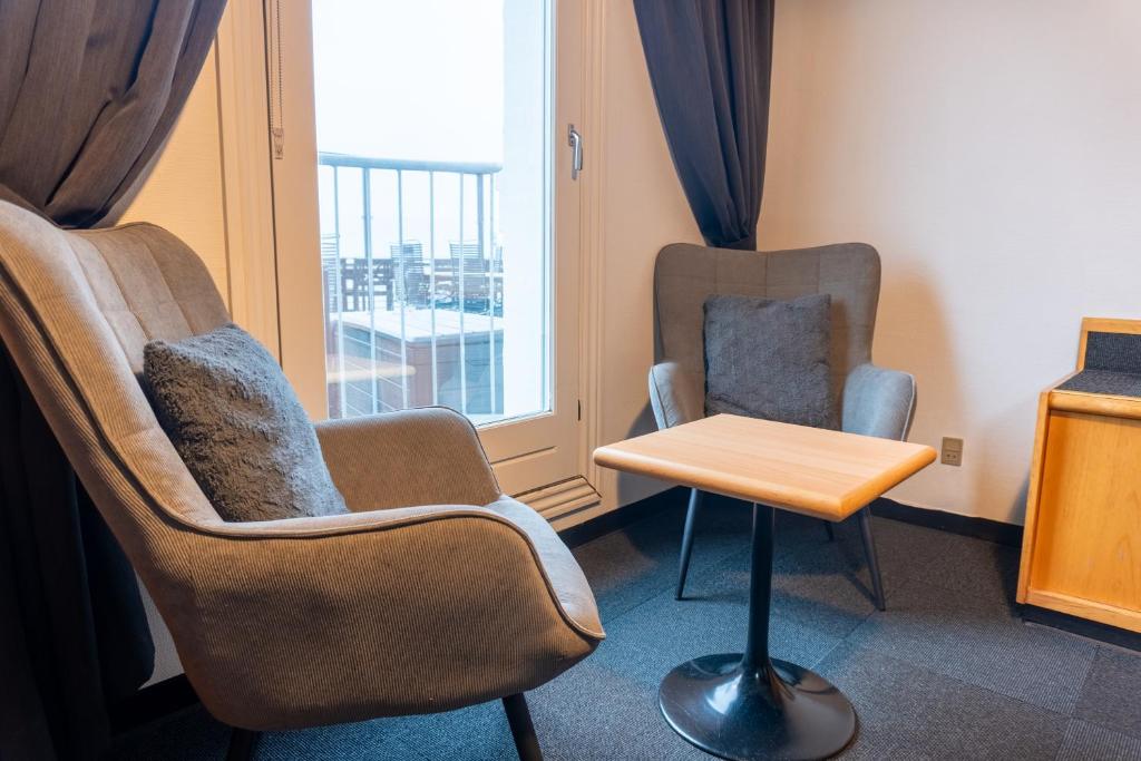 Posezení v ubytování Hotel Assens