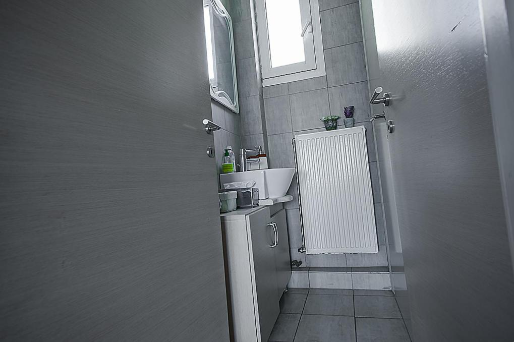 Kuchyň nebo kuchyňský kout v ubytování Evexia suite, central apartment