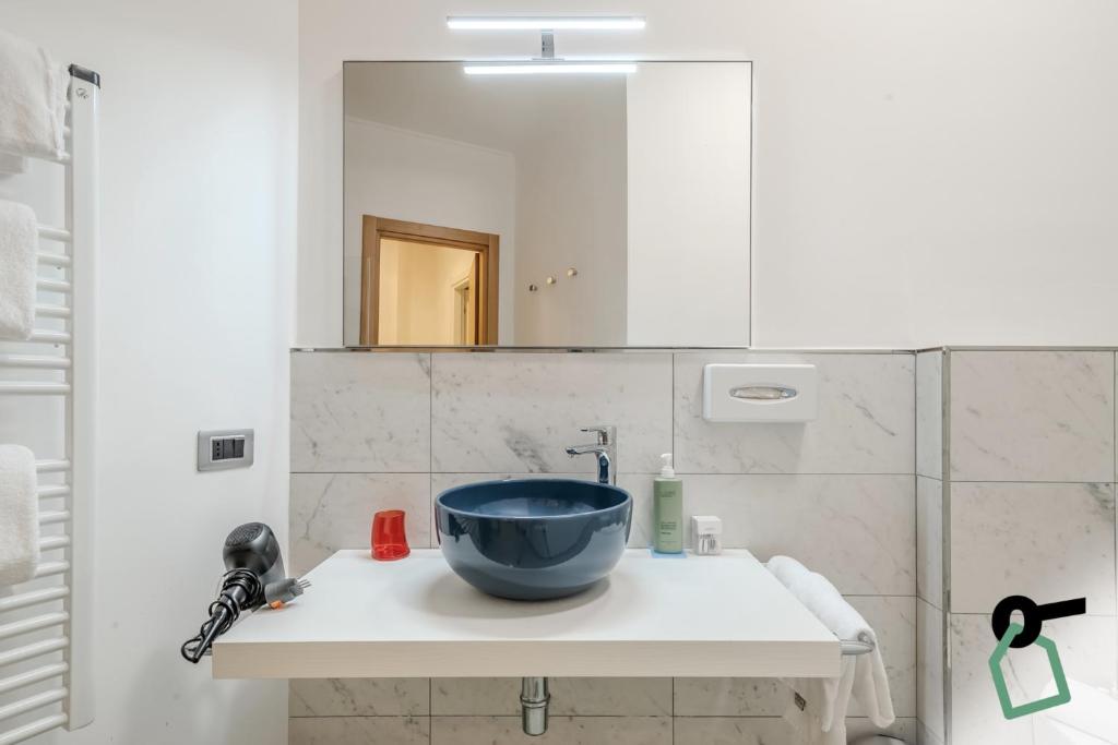 Koupelna v ubytování HOTIDAY Apartment Collection - La Spezia