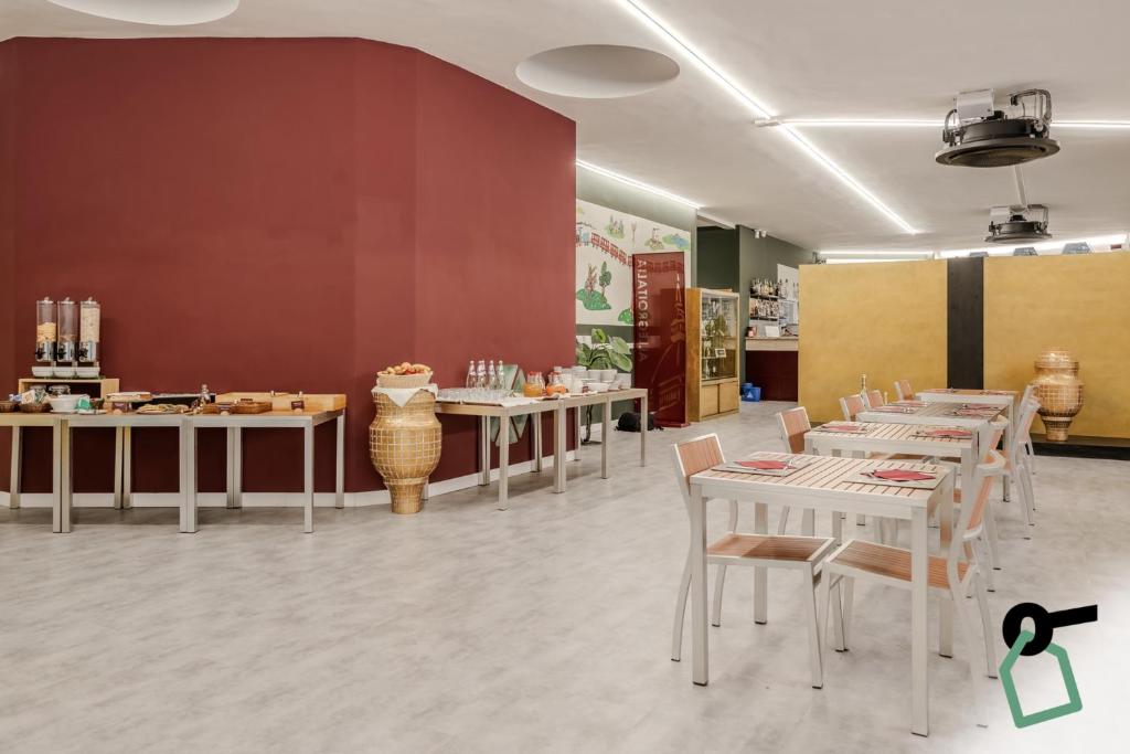 Restaurace v ubytování HOTIDAY Apartment Collection - La Spezia