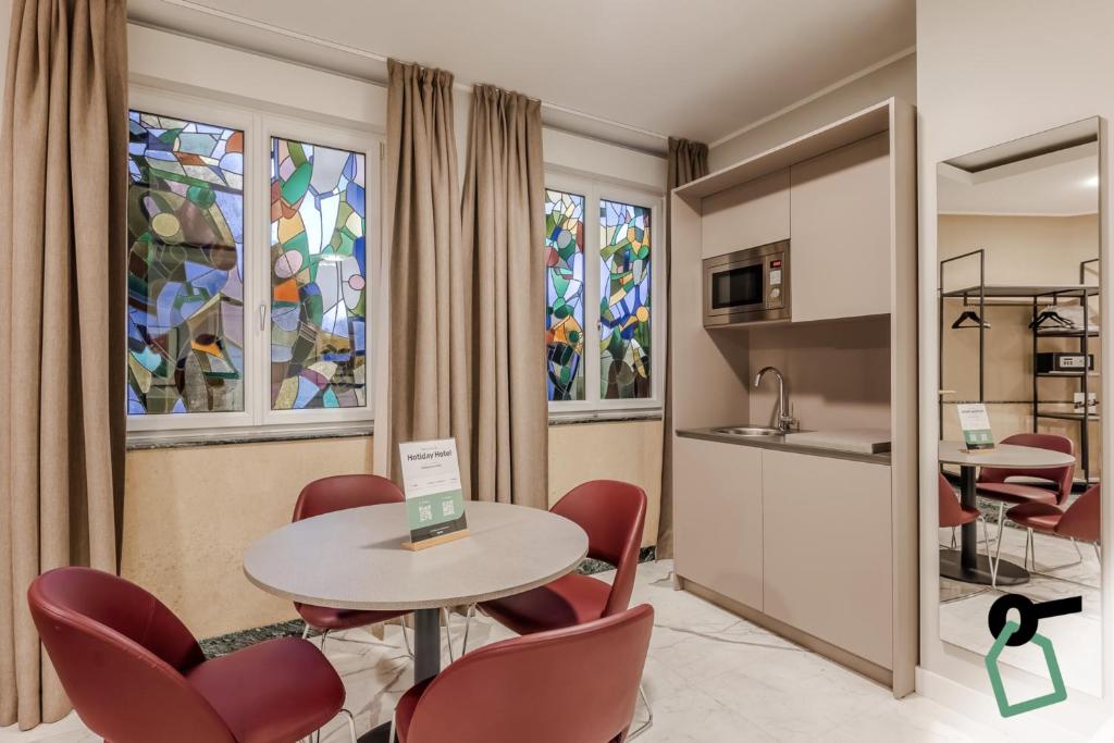 Kuchyň nebo kuchyňský kout v ubytování HOTIDAY Apartment Collection - La Spezia