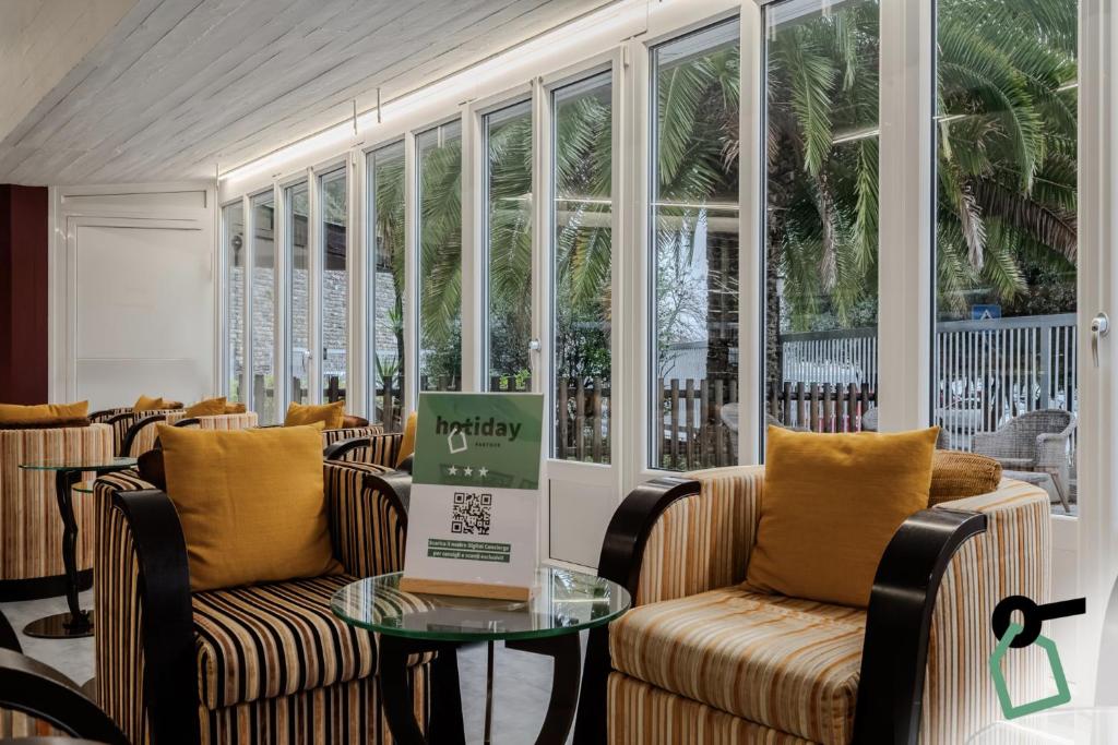 Posezení v ubytování HOTIDAY Apartment Collection - La Spezia