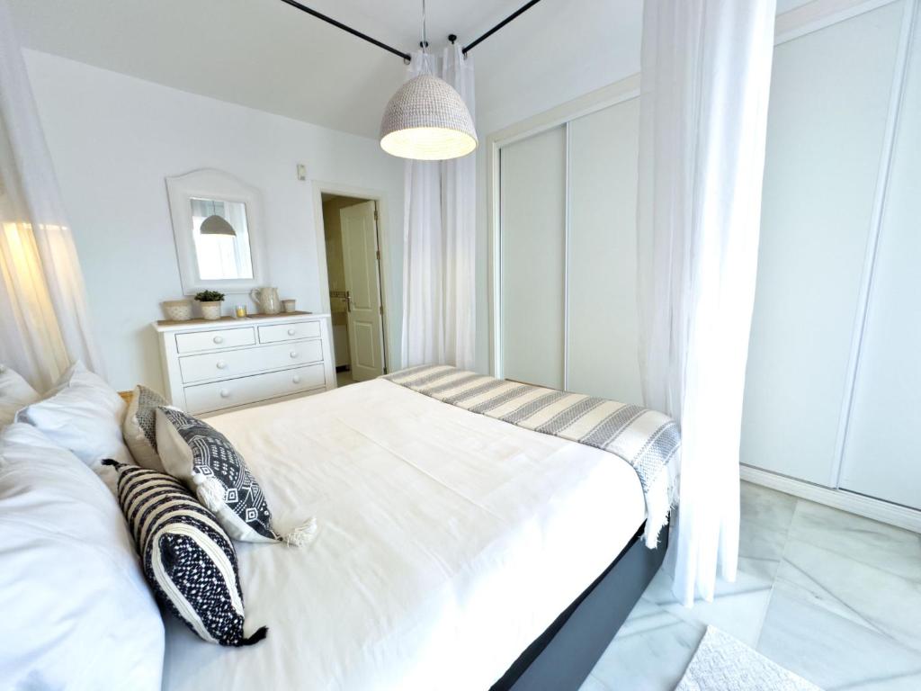 Posteľ alebo postele v izbe v ubytovaní Apartamento Bajo con terraza en Lorcrimar V