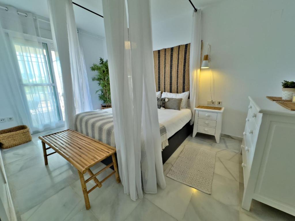 Posteľ alebo postele v izbe v ubytovaní Apartamento Bajo con terraza en Lorcrimar V