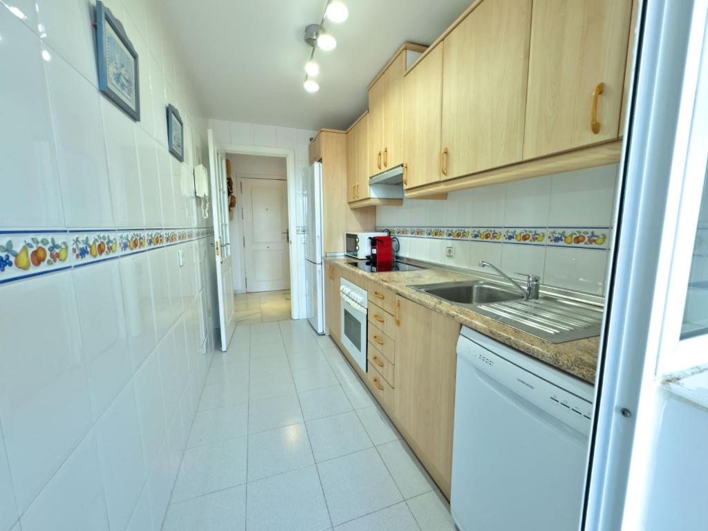Kuchyňa alebo kuchynka v ubytovaní Apartamento Bajo con terraza en Lorcrimar V