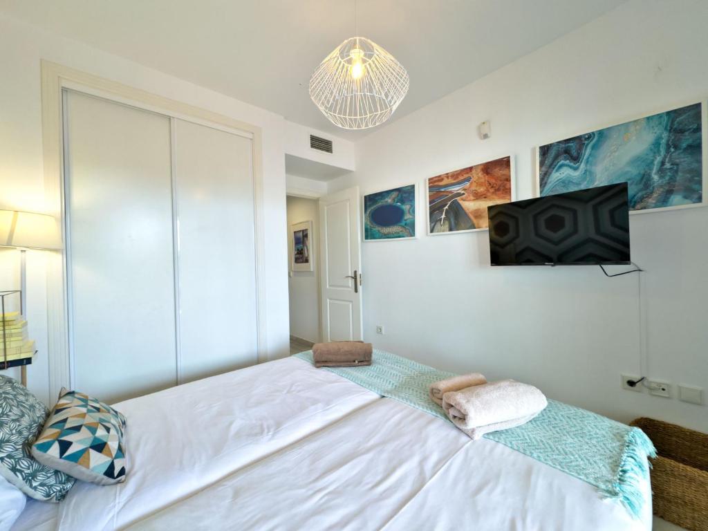 Posteľ alebo postele v izbe v ubytovaní Apartamento Bajo con terraza en Lorcrimar V