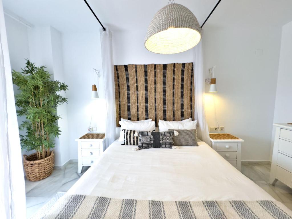 Posteľ alebo postele v izbe v ubytovaní Apartamento Bajo con terraza en Lorcrimar V