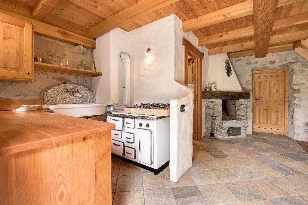 Kuchyň nebo kuchyňský kout v ubytování Chalet Bio Wild