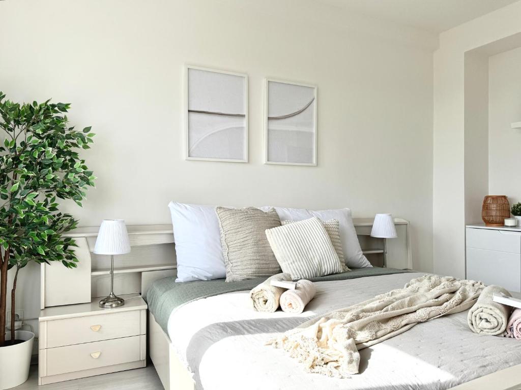Postel nebo postele na pokoji v ubytování Modern Apartment City Hideaway