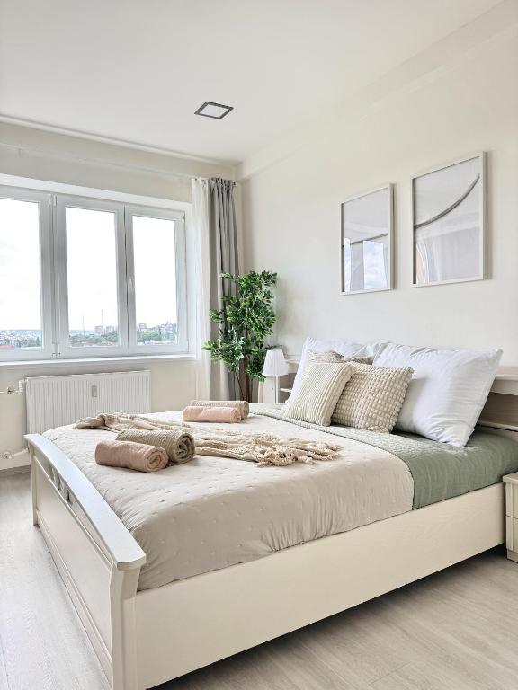 Postel nebo postele na pokoji v ubytování Modern Apartment City Hideaway