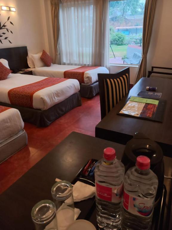 Katil atau katil-katil dalam bilik di Waterfront Resort by KGH Group