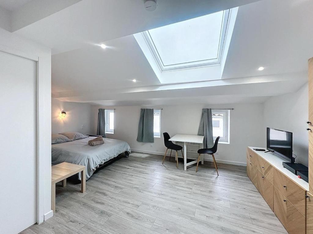 Photo de la galerie de l'établissement La Suite Élégante - Studio Climatisé, à Villefranche-de-Lauragais