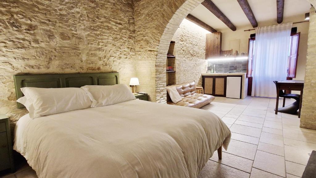 Postel nebo postele na pokoji v ubytování CASA OCRA
