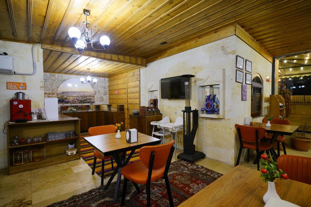 TV a/nebo společenská místnost v ubytování Balloon Cave Hotel