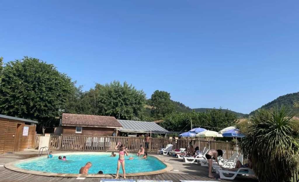 a group of people in a swimming pool at Camping 3 étoiles - ccaaafd in Sorèze