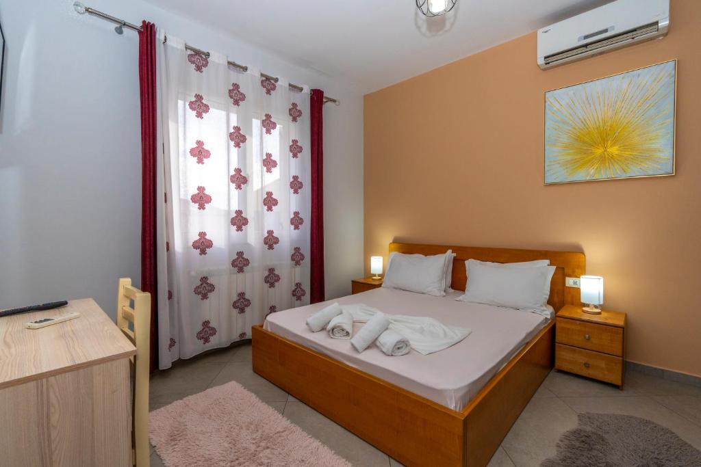 Cama o camas de una habitación en Hotel Shkodra L