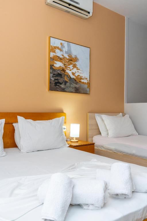 Cama o camas de una habitación en Hotel Shkodra L