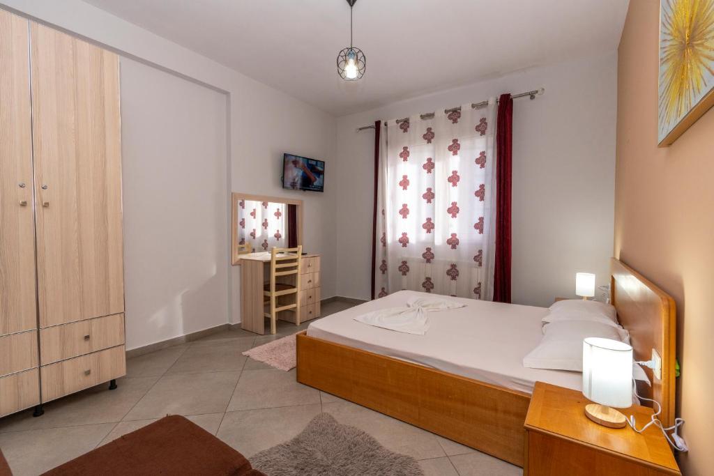 Cama o camas de una habitación en Hotel Shkodra L