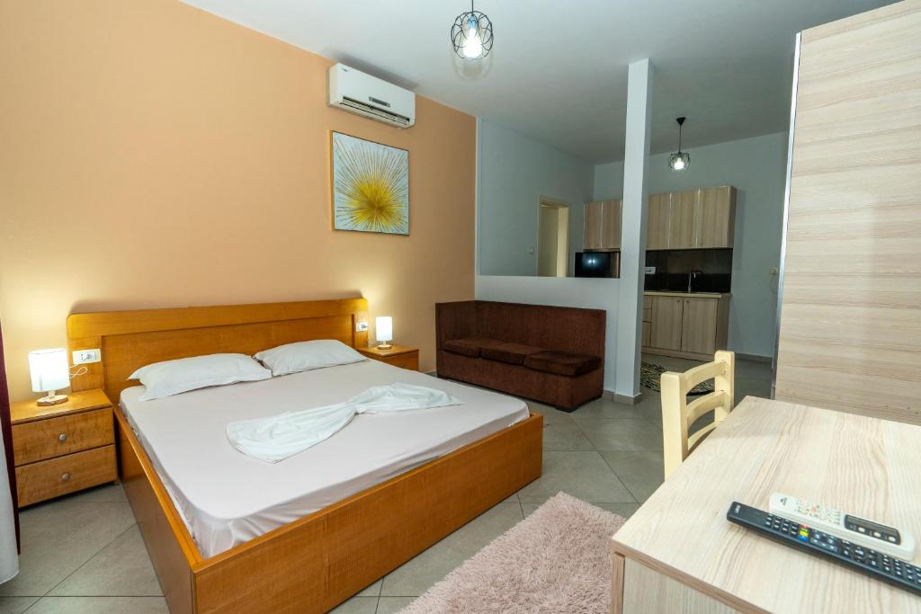 Cama o camas de una habitación en Hotel Shkodra L