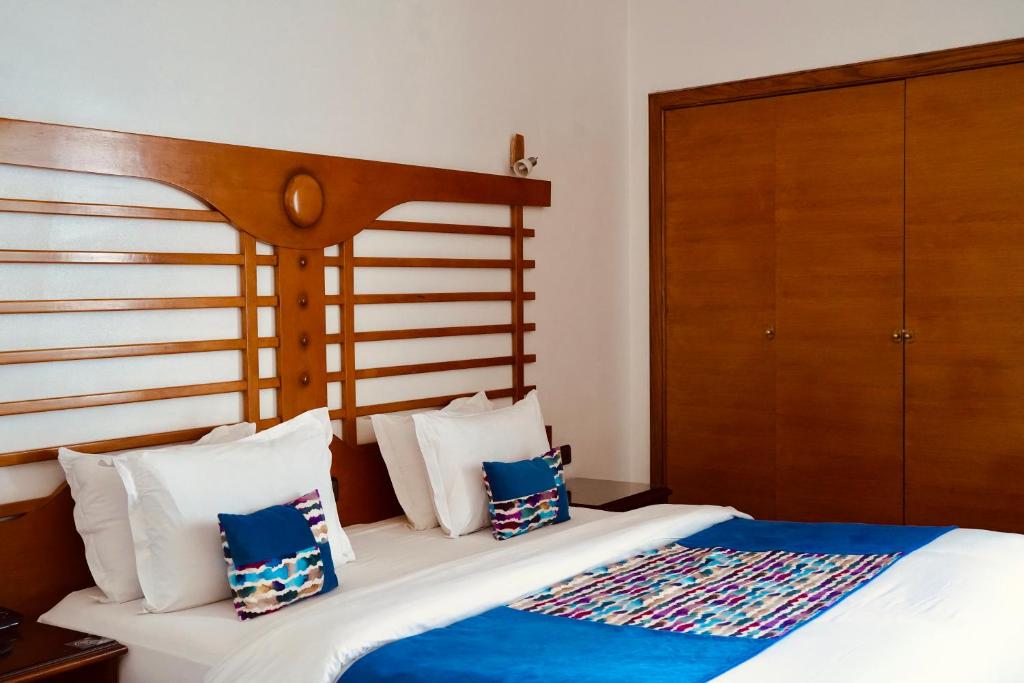 Letto o letti in una camera di Hôtel Rembrandt