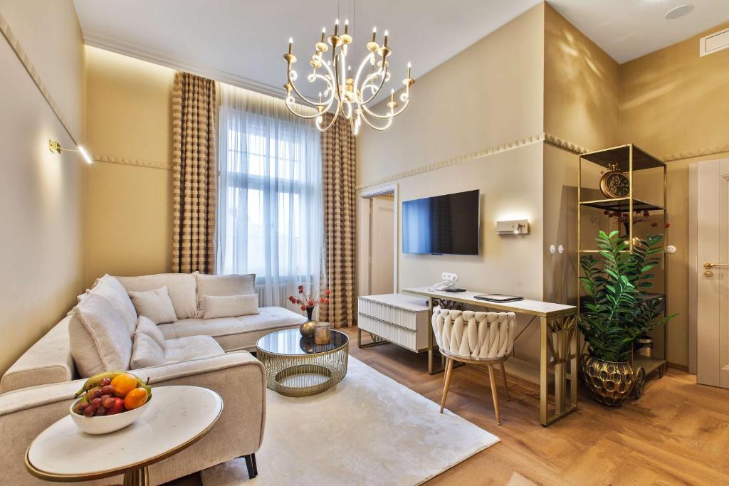 TV a/nebo společenská místnost v ubytování Mestský Hotel Ďumbier