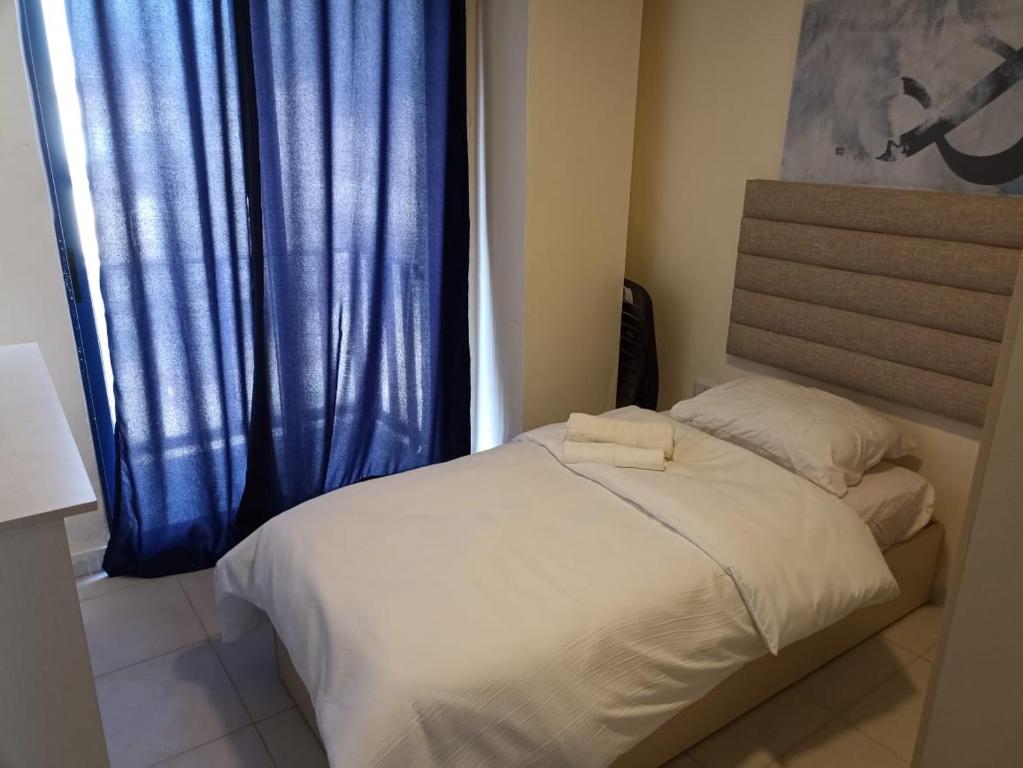 Postel nebo postele na pokoji v ubytování citadel mountain sun guest house