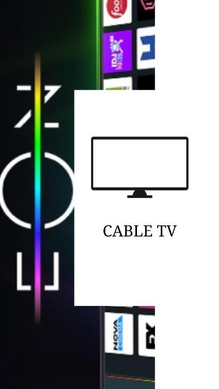Televízia a/alebo spoločenská miestnosť v ubytovaní Houseloft Rotunda Getaway