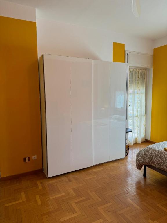 Łóżko lub łóżka w pokoju w obiekcie Isola Flat