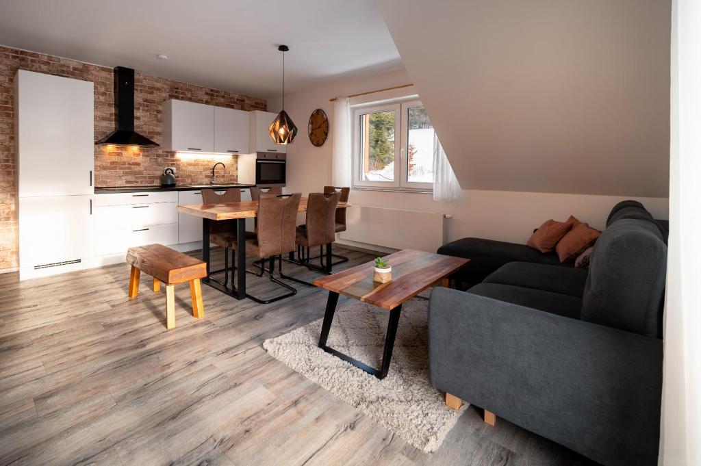 Posezení v ubytování Apartmán U Mamuta