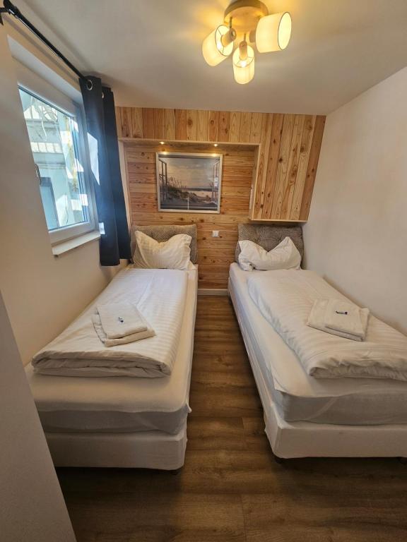 Postel nebo postele na pokoji v ubytování Gästehaus Pernull