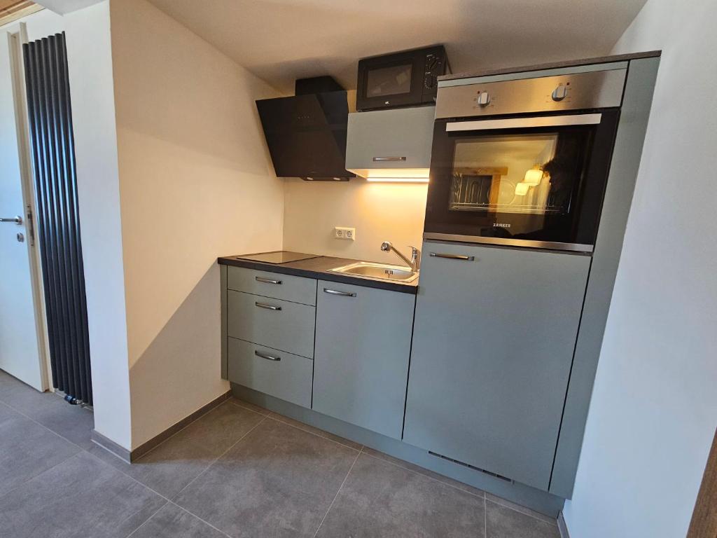 Kuchyň nebo kuchyňský kout v ubytování Gästehaus Pernull