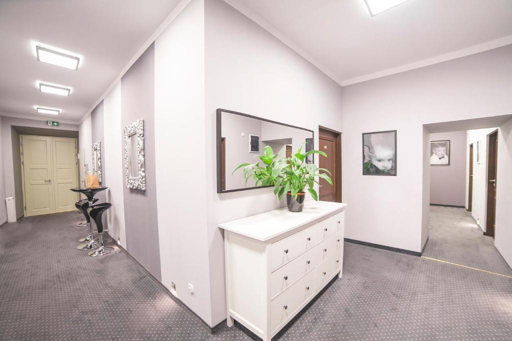 Televízia a/alebo spoločenská miestnosť v ubytovaní Residence B&B La Fontaine Aparthotel