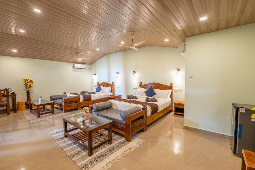 Postel nebo postele na pokoji v ubytování Goa Beach Villa