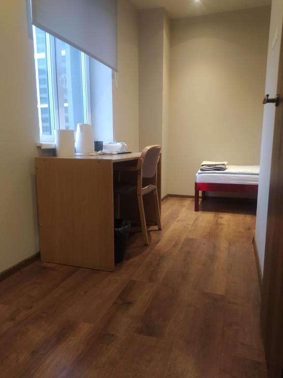 Postel nebo postele na pokoji v ubytování RVR Smart Apartments Riga with self Check-in