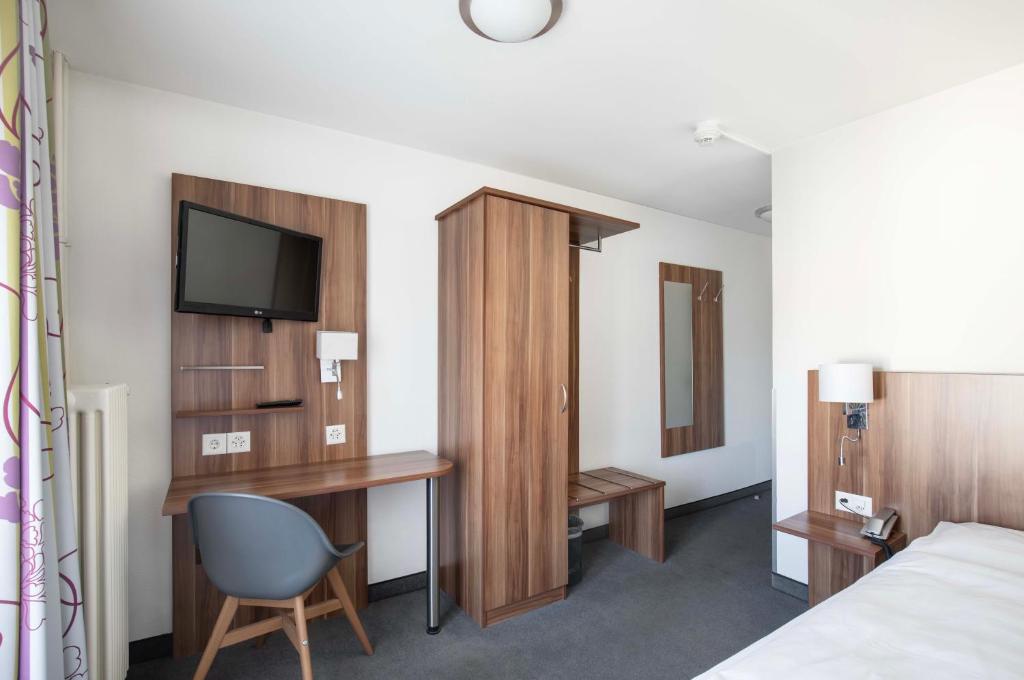 Postel nebo postele na pokoji v ubytování Hotel Resslirytti