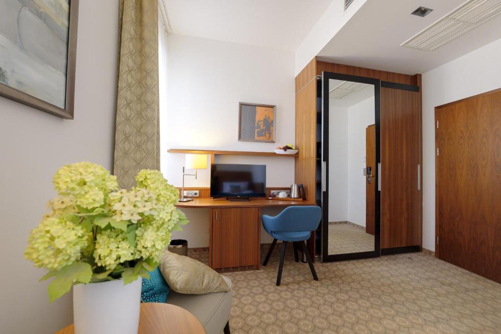 TV a/nebo společenská místnost v ubytování Hotel Silenzio