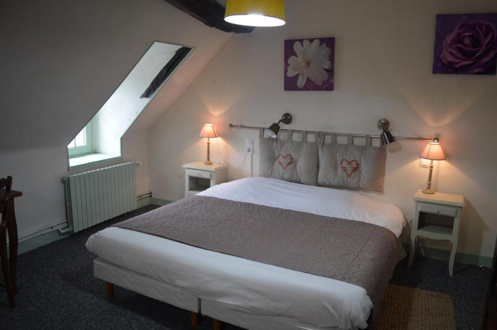 Postel nebo postele na pokoji v ubytování Le Relais du Morvan