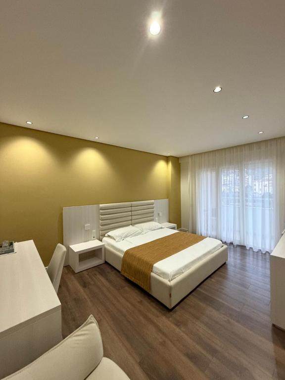 Postel nebo postele na pokoji v ubytování Maxi Room