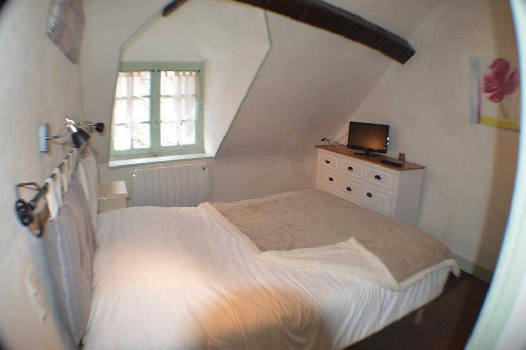 Postel nebo postele na pokoji v ubytování Le Relais du Morvan