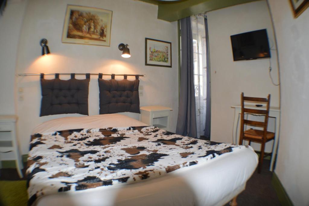 Postel nebo postele na pokoji v ubytování Le Relais du Morvan