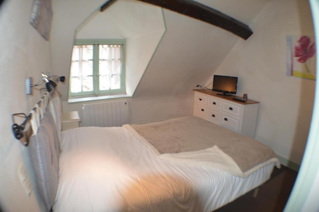 Postel nebo postele na pokoji v ubytování Le Relais du Morvan