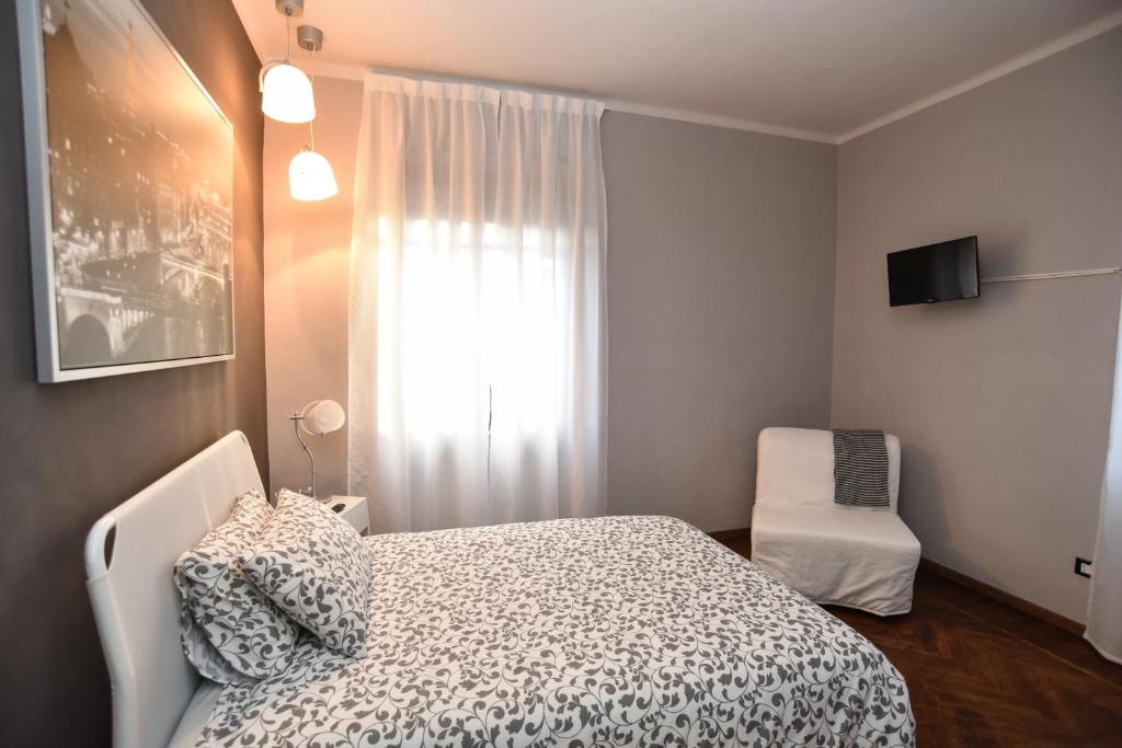 Letto o letti in una camera di L'Agrifoglio Affittacamere