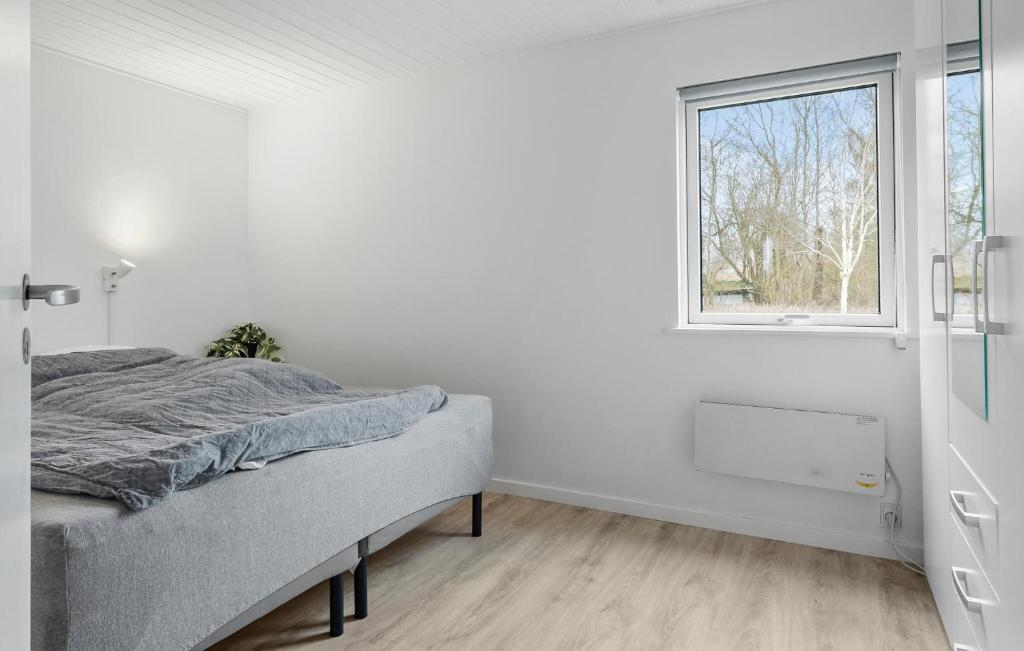 Postel nebo postele na pokoji v ubytování Holiday Home Slusevej