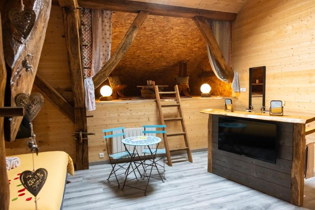 Posezení v ubytování Maison d'hôtes et SPA La Boucotte