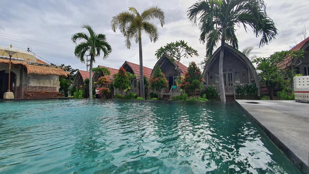 Bazén v ubytování Daghan Cottage Nusa Penida nebo v jeho okolí