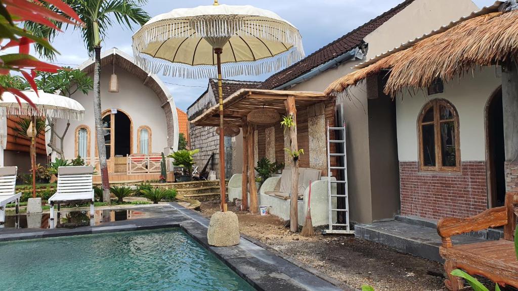 Bazén v ubytování Daghan Cottage Nusa Penida nebo v jeho okolí