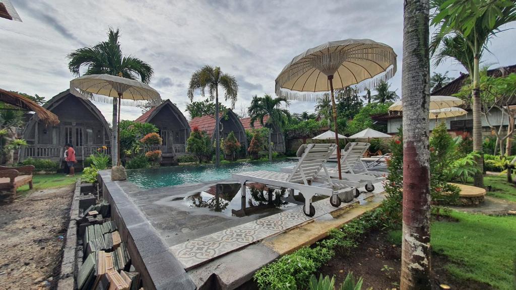 Bazén v ubytování Daghan Cottage Nusa Penida nebo v jeho okolí